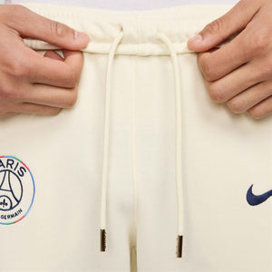 NIKE PSG 24-25 CLUB FLEECE PANT COCONUT MILK/NAVY