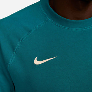 NIKE PSG 24-25 TRAVEL SS TOP GEODE TEAL